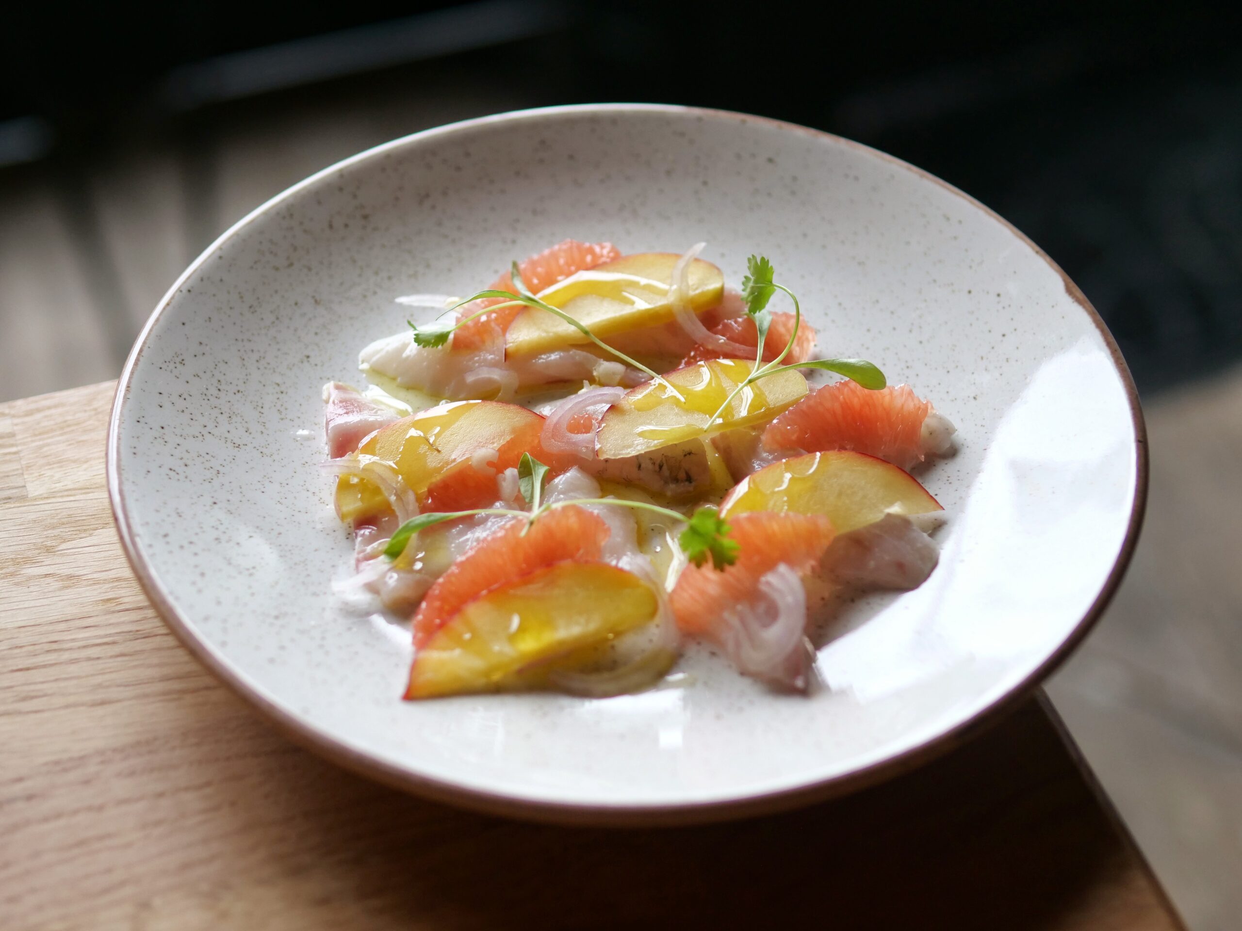 Tuna Crudo with peaches and grapefruit