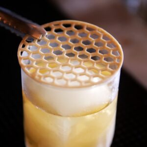 Serving the Honeygroni at Apiary, cafe & Bar in Brighton